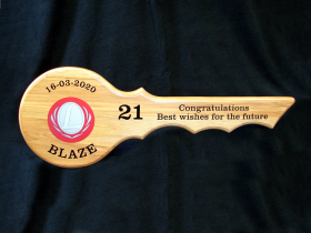 Rimu 21st key for Blaze with black vinyl lettering.