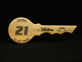Jade's laser engraved rimu 21st key.