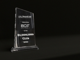 Classic Crystal celebrating BDF Electrical joining the $1,000,000 Club from JA Russell