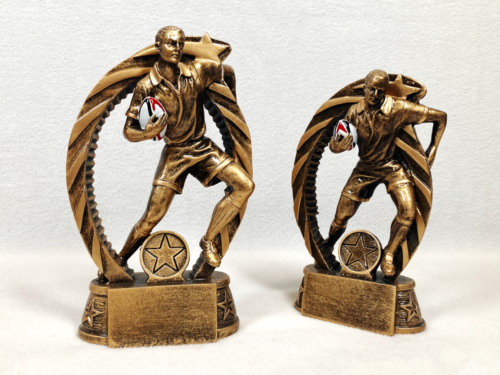 Male Rugby Player with Ball Trophy