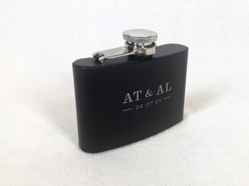 Photo of engraved black coated 4oz hipflask